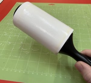 cleaning cutting mat with lint roller