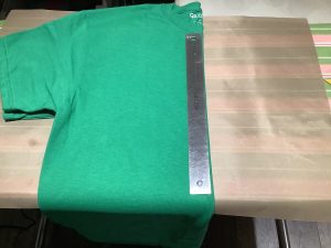 fold center of HTV shirt