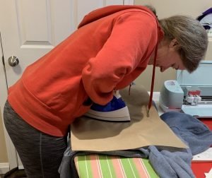 ironing on htv vinyl shirt