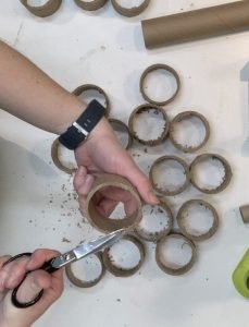 Trimming cardboard rolls