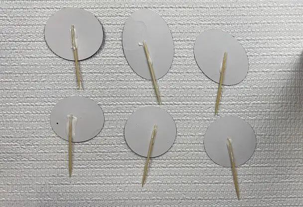 Free Halloween Cupcake Toppers with Cricut gluing toothpicks