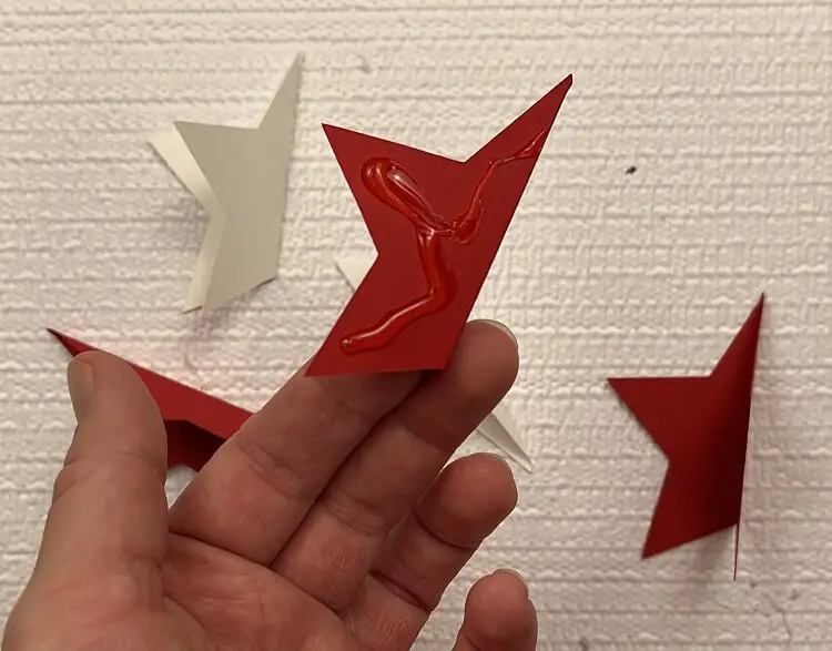 gluing paper ornament pieces