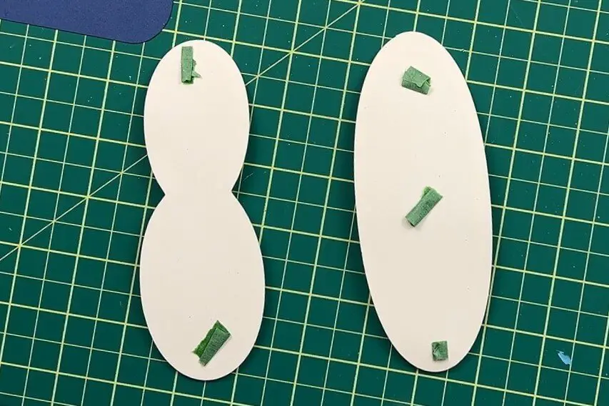 applying painters tape to back of shaker
