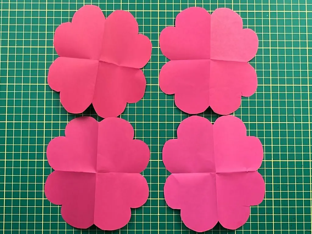four cut flower pieces
