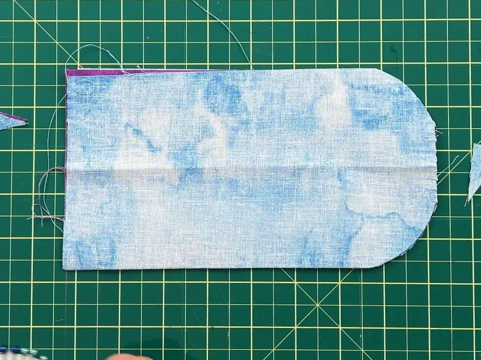 cut fabric to shape and size