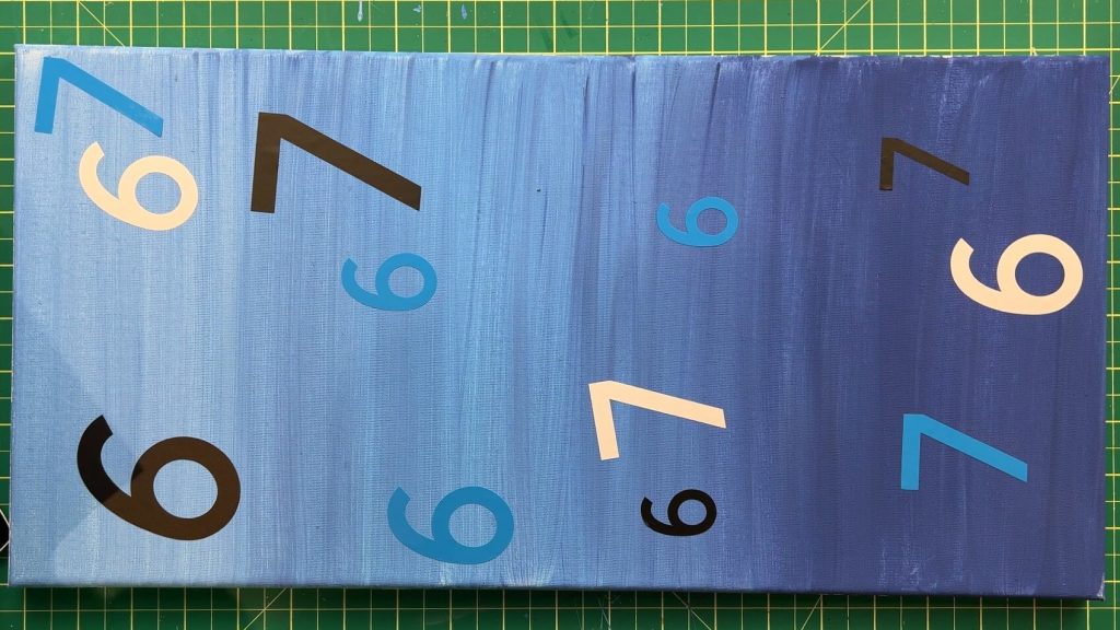 applying vinyl  6 7 s to painted canvas