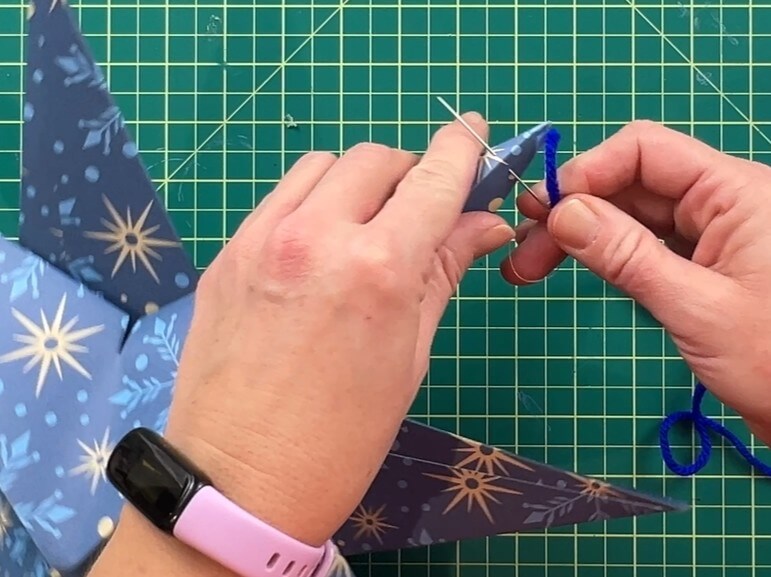 adding hanging string to paper star