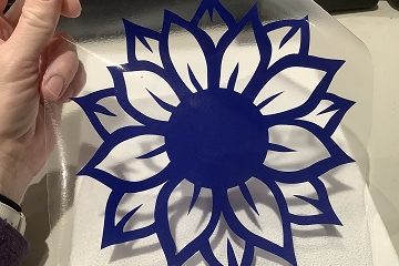 decal applying vinyl to canvas